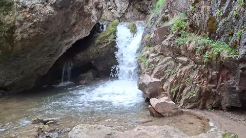 Majestic waterfall in lush green forest, tranquil nature landscape in 4K. Stock Footage 307565249