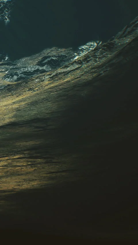 Majestic waves dance under a moonlit sky in a serene coastal landscape Video stock 341415442