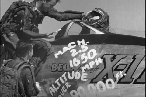 Major Arthur Murray and Chuck Yeager paint on Bell X-1 - 1954 Stock Footage 104659706