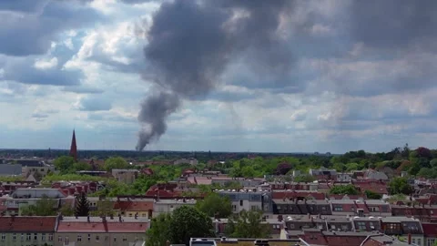 Major fire smoke plume over berlin cityscape Nice aerial top view flight drone Stock Footage 274371055