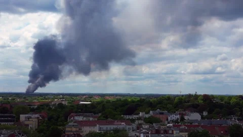 Major fire smoke plume over berlin cityscape Wonderful aerial view flight drone Stock Footage 274371091