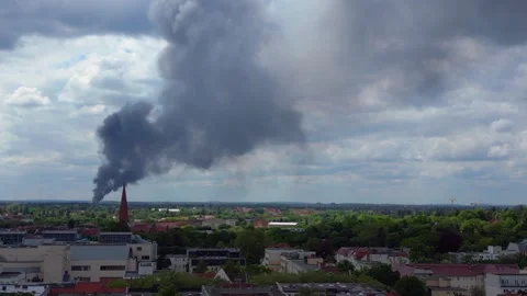 Major fire smoke plume over berlin cityscape Marvelous aerial view flight drone Stock Footage 274371126