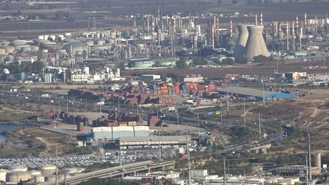 Major industrial zone with smokestacks of petrochemical facility Haifa, Israel Stock Footage