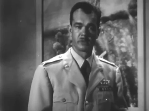 Major R. R. McCormick shows the point where the B47 aircraft veered off the Stock Footage 79459456
