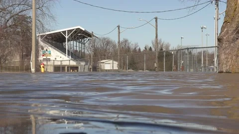 Major river flooding during record warm temperatures in Ontario Canada Stock Footage 150242810