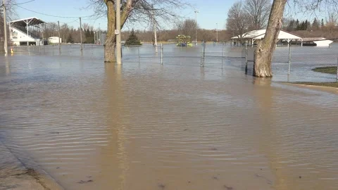 Major river flooding during record warm temperatures in Ontario Canada Stock Footage 150242995