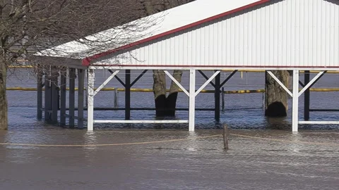 Major river flooding during record warm temperatures in Ontario Canada Stock Footage 150244856