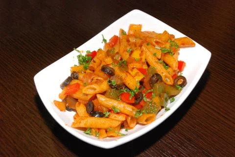 Makaroni with tomato paste Stock Photos