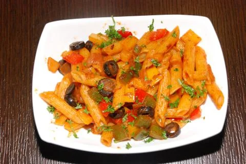 Makaroni with tomato paste Stock Photos