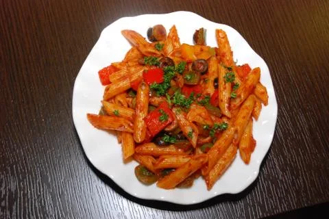 Makaroni with tomato paste Stock Photos