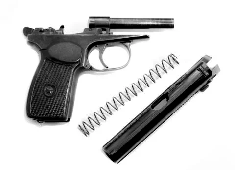 Makarov system pistol disassembled isolated on white background Stock Photos