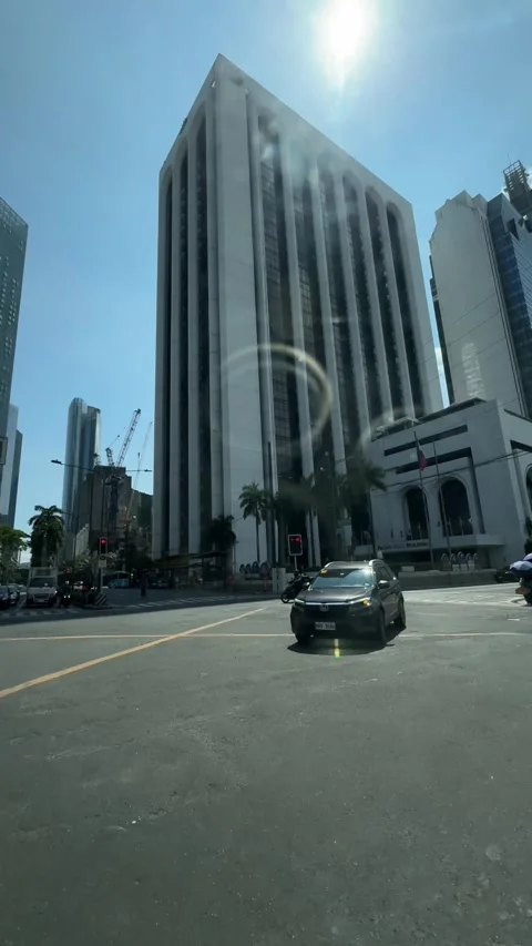 Makati CBD Intersection Driving POV Corporate Skyscrapers Traffic 4K 60fps 스톡 동영상 338185669