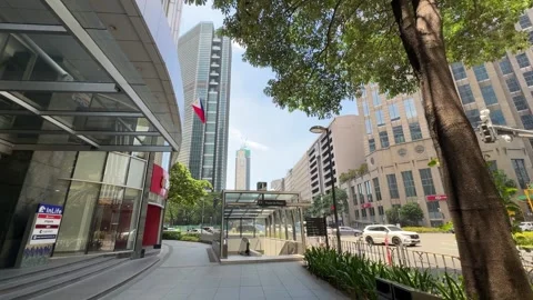 Makati CBD modern corporate district street corner and brick sidewalk 4K Stock Footage 337448962