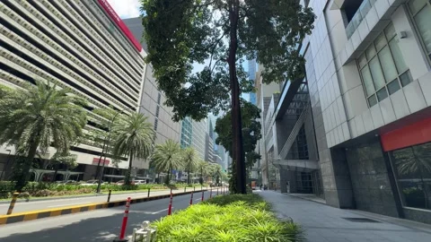 Makati CBD modern pedestrian covered walkway architecture low angle view 4K Vídeos de archivo 337448979