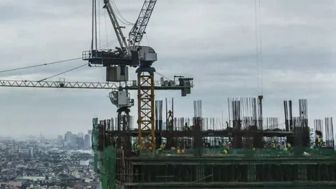 Makati: City Construction Crane with Clouds during Day, Detail Stock Footage 69214376