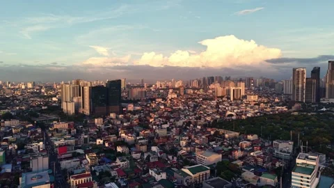 Makati Skyline Beyond Dense Low Rise Rooftops Massive Cumulus Clouds 스톡 동영상 330516467