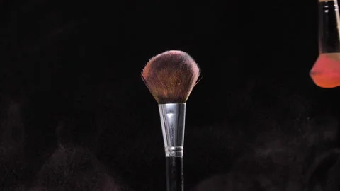 Make-up and beauty concept. Make-up brush with orange powder Stock Footage 92937225