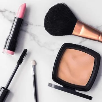Make-up and cosmetics flatlay on marble Stock Photos