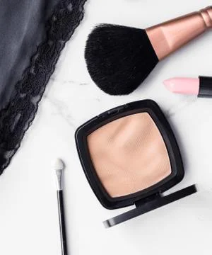 Make-up and cosmetics flatlay on marble Stock Photos