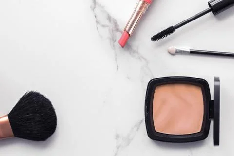 Make-up and cosmetics flatlay on marble Foto stock