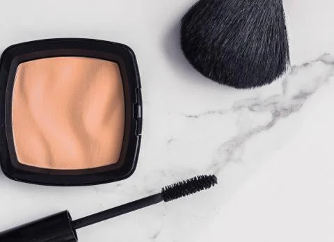 Make-up and cosmetics flatlay on marble Stock Photos