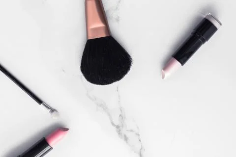 Make-up and cosmetics flatlay on marble Stock Photos