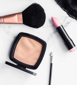 Make-up and cosmetics flatlay on marble Stock Photos