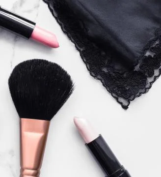 Make-up and cosmetics flatlay on marble Stock Photos