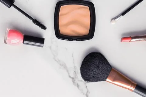 Make-up and cosmetics flatlay on marble Stock Photos