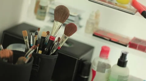 Make-up are products used to enhance the appearance or scent of the body Stock Footage 63550672