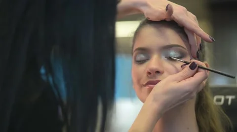 Make Up Artist And Beautiful Model Brunette On Set Stock Footage 56730745