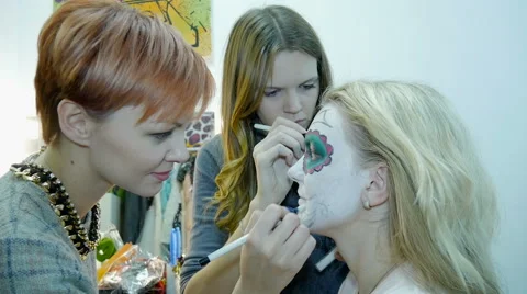 Make-up artist and stylist doing makeup model for Halloween Video stock 69006897