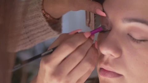 Make-up artist applying makeup Stock Footage 74765520
