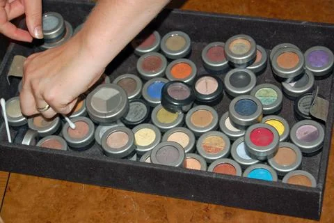 Make Up Artist chosing eye shadow colours Stock Photos