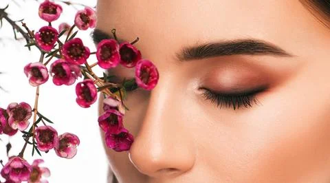 The make-up artist does Long-lasting styling of the eyebrows and makes the .. Stock Photos