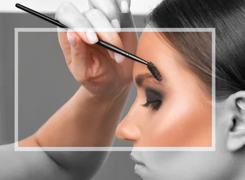The make-up artist does Long-lasting styling of the eyebrows and will color.. Stock Photos
