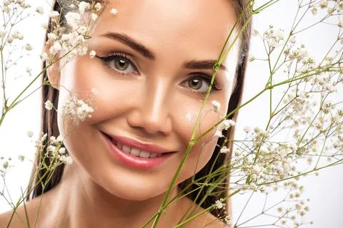 The make-up artist does Long-lasting styling of the eyebrows and makes the .. Stock Photos