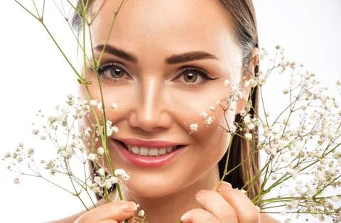 The make-up artist does Long-lasting styling of the eyebrows and makes the .. Stock Photos