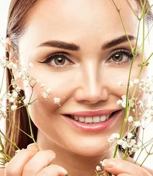 The make-up artist does Long-lasting styling of the eyebrows and makes the .. Stock Photos