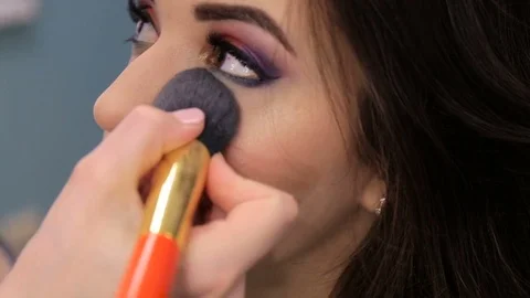 Make-up artist doing make-up, face close-up Stock Footage 72793792