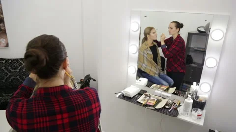 Make-up artist doing make-up Stock Footage 68918215