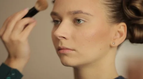 Make-up artist doing make-up before the show models Stock Footage 56678936