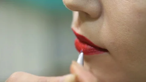 Make-up artist doing a model's makeup at the salon Stock-Footage 71849437
