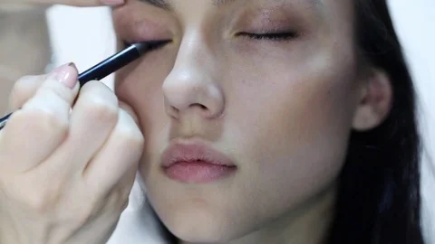 Make up artist doing professional make up Stock Footage 75628780