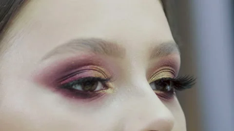 Make-up artist doing professional make-up young girl in a beauty salon 스톡 동영상 113852179
