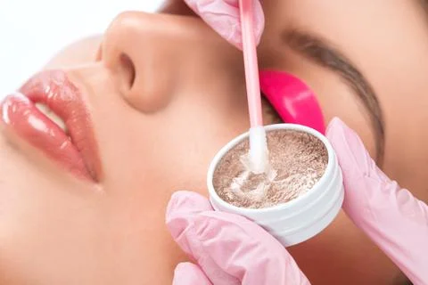 Make-up artist makes the procedure of lamination and dyeing of eyelashes to.. Stock Photos