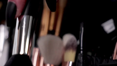 Make up artist picking up brush for blush. Stock Footage 308035750