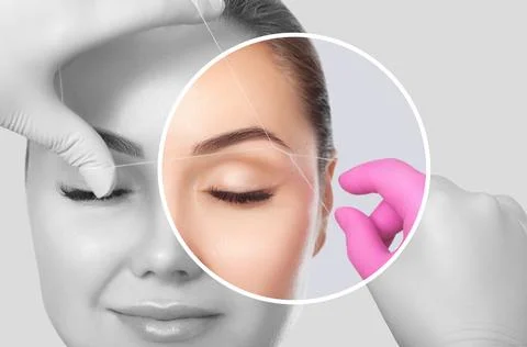 The make-up artist plucks eyebrows with a thread close-up. Women's cosmetol.. Stock Photos