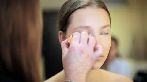 Make-up artist in the process of creating an image Stock Footage 68460092