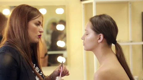 Make-up artist in the process of creating an image Stock Footage 68460415
